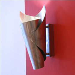 A hallway is an ideal place for sconces and wall lighting, placed every few meters, they will adequately light the hallway creating a safer place to walk while adding sophistication and interest.